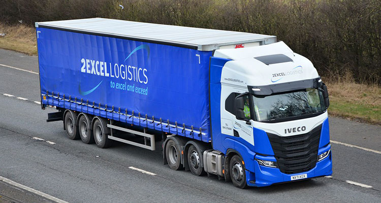 2Excel Logistics curtain sided Iveco truck