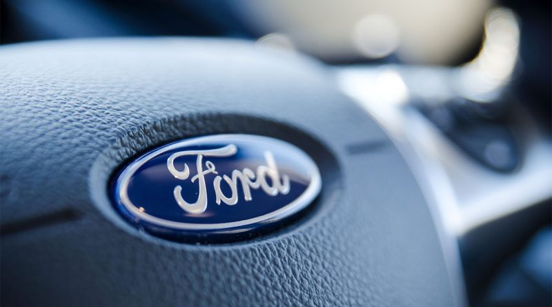 Ford logo on steering wheel in car to support recalls article