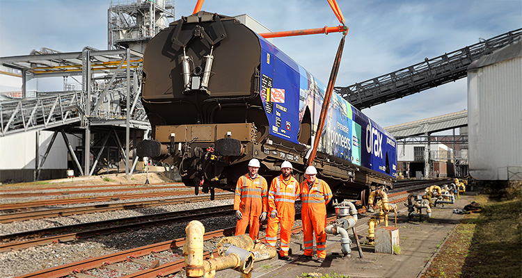 a specialized rail freight wagon designed for transporting biomass, specifically for Drax Power Station