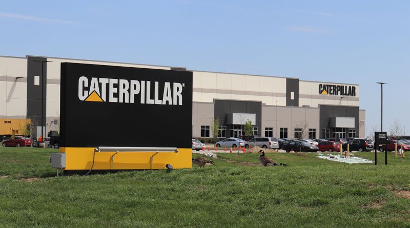Caterpillar factory floor with industrial machinery and assembly line equipment