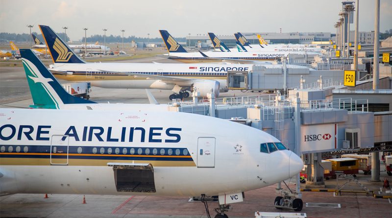 Singapore Airlines Airbus A380 taxiing at sunset at Dubai International Airport