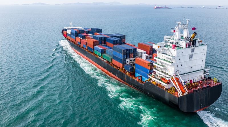 Global shipping shifts with the $4.2 billion sale of ZIM Aerial view cargo container ship sailing, container cargo ship in import export and business logistic